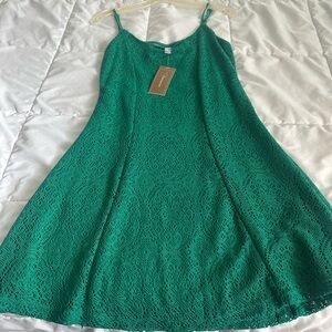 Alya green dress, criss cross back.